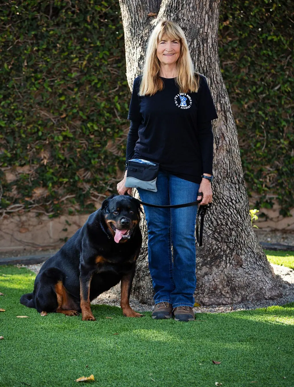Karen Widaman with a trained dog at It’s A Dog’s World K-9 Academy